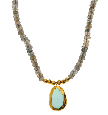 <P>Long Necklace of Peridot and Green Amethyst with two Bassonite stones wrapped with 24K Gold</P>