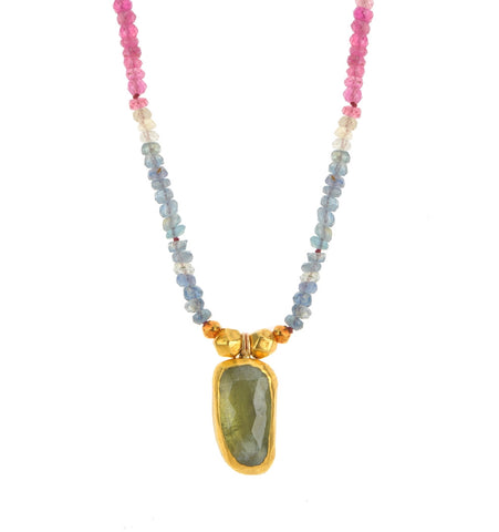 <P dir=ltr class=Body>Multi Sapphire Necklace with an uneven shaped Green Tourmaline drop wrapped with 24K Gold. size of drop may vary.</P>