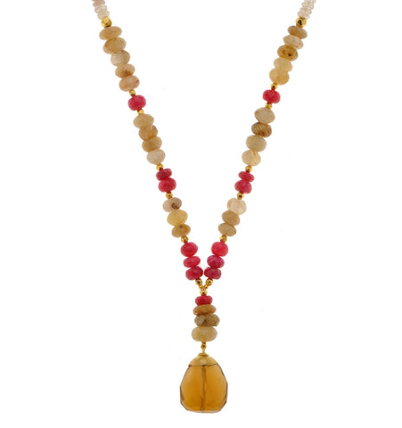 <P dir=ltr class=Body>Long Rutilated Quartz and Ruby Necklace with a Whisky Quartz drop and 18K Gold Beads and Dome</P>