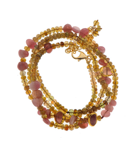 <P dir=ltr class=Body>Bracelet of Pink and Green Tourmaline wrapped with 24K Gold 29" Long or upon request</P>