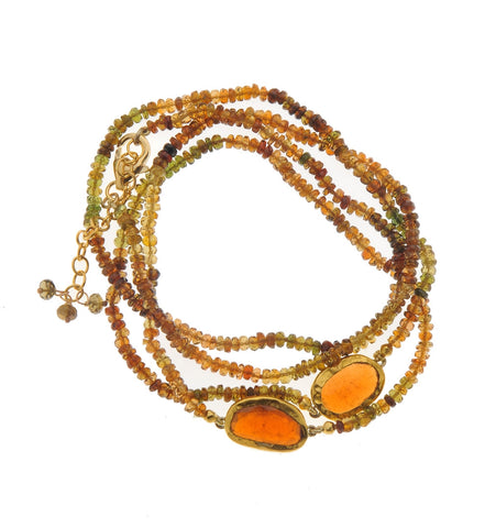 <P dir=ltr class=Body>&nbsp;Long Bracelet of Tourmalines with two Hessonite stones wrapped with 24K Gold 28" Long or upon request</P>