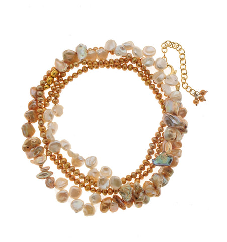 <P dir=ltr class=Body>Long Bracelet of MOP and Kashi Pearls with three 18K Gold Nuggets. 37" Long or upon request</P>