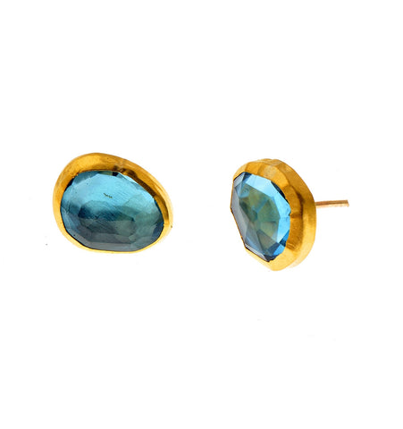 <P dir=ltr class=Body>Uneven shaped Blue Topaz stud Earrings wrapped with 24K Gold </P>