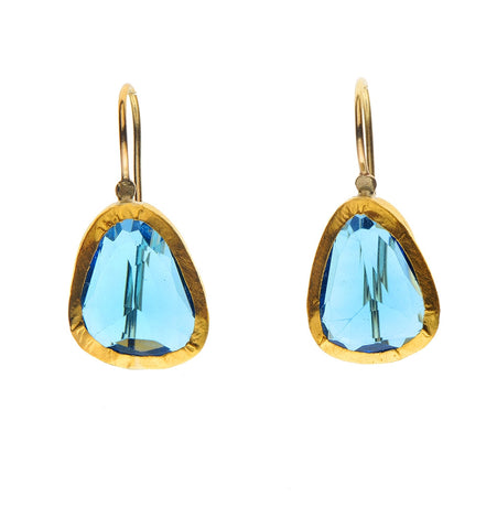 <P dir=ltr class=Body>Uneven shaped Blue Topaz Earrings wrapped with 24K Gold Hang 25mm Width 10mm</P>