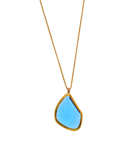 <P dir=ltr class=Body>Gold Necklace with a Large uneven Blue Topaz pendant wrapped with 24K Gold 18" Long + 1" Pendant</P>