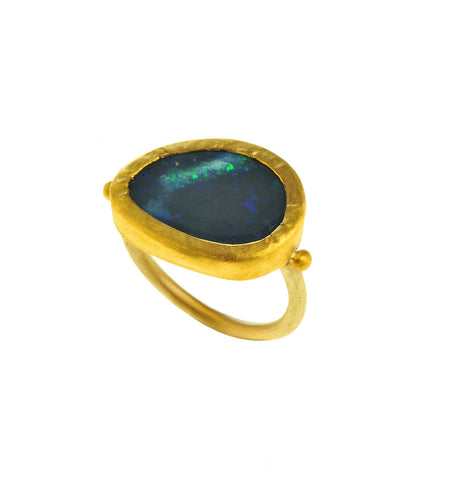 <P dir=ltr class=Body>Uneven Shaped Opal Gold Ring wrapped with 24K Gold Measurments of stone is&nbsp;20 x 16mm Shape, Size and Color of Opal may vary</P>