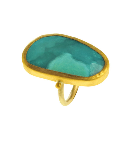 <P dir=ltr class=Body>Large uneven Oval shaped Opal Gold Ring wrapped with 24K Gold Measurments of stone is&nbsp;17 x 30mm Shape, Size and Color of Opal may vary</P>