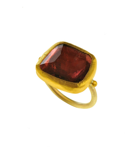 <P dir=ltr class=Body>Pink Tourmaline uneven square shaped Gold Ring, wrapped with 24K Gold Measurments of stone is&nbsp;18 x 17mm Shape, Size and Color of Tourmaline may vary</P>