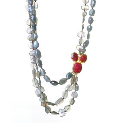 Add something elegant and sophisticated to your jewelry collection. This three-strand Necklace is finely handcrafted of amazing Gray Moonstone gemstones, with a gorgeous red Ruby(corundum) clasp wrapped in 24K Gold. It is of unique design and quite sensational. 16.5" or upon request