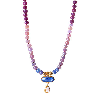 Add a treasure to your jewelry collection. This fabulous Necklace is hand-crafted of wonderful Multi-Sapphire gemstones, with double drops of Kyanite and Tourmaline wrapped in 24K Gold. The colors of the stones are unbelievable and will attract attention and win compliments.