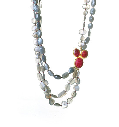 Add something elegant and sophisticated to your jewelry collection. This three-strand Necklace is finely handcrafted of amazing Gray Moonstone gemstones, with a gorgeous red Ruby(corundum) clasp wrapped in 24K Gold. It is of unique design and quite sensational. 16.5" or upon request